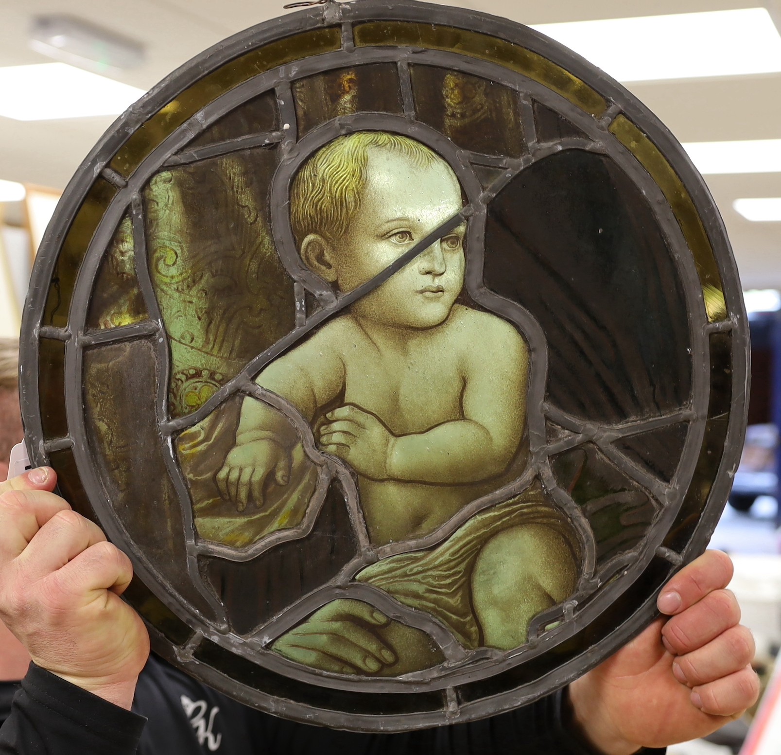 A Victorian stained glass baby Jesus roundel, 43cm